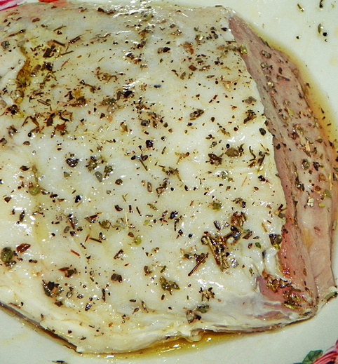 Cotlet de porc cu spanac, invelit in bacon